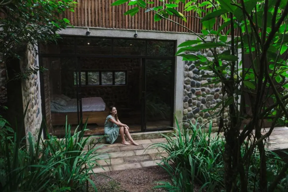 Stone and timber bungalow in the garden